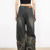 Straight-leg hiphop-jeans med et flosset og slidt stjernemønster