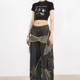 Straight-leg hiphop-jeans med et flosset og slidt stjernemønster