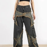 Straight-leg hiphop-jeans med et flosset og slidt stjernemønster