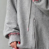 Oversized falmet lyserød hættetrøje med lynlås