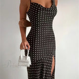 Afslappet midikjole med polkaprikker, rygløs og ærmeløs, med slids, høj hals og slids, til kvinder