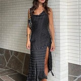 Afslappet midikjole med polkaprikker, rygløs og ærmeløs, med slids, høj hals og slids, til kvinder