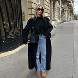 Oversized dobbeltradet frakke med bælte