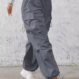 Afslappede cargobukser med lommer og snøre