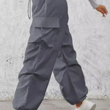 Afslappede cargobukser med lommer og snøre