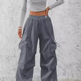 Afslappede cargobukser med lommer og snøre