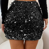 Mini bodycon-nederdel med pailletter forneden