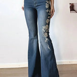 Vintage bootcut jeans med plantebroderi