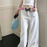 Lyserøde jeans med brede ben og broderet sløjfe