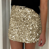 Mini bodycon-nederdel med pailletter forneden