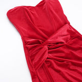 Fløjlsaftenkjole med korset i knoglen