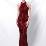 Paillettebesat havfrue-maxikjole med åben ryg