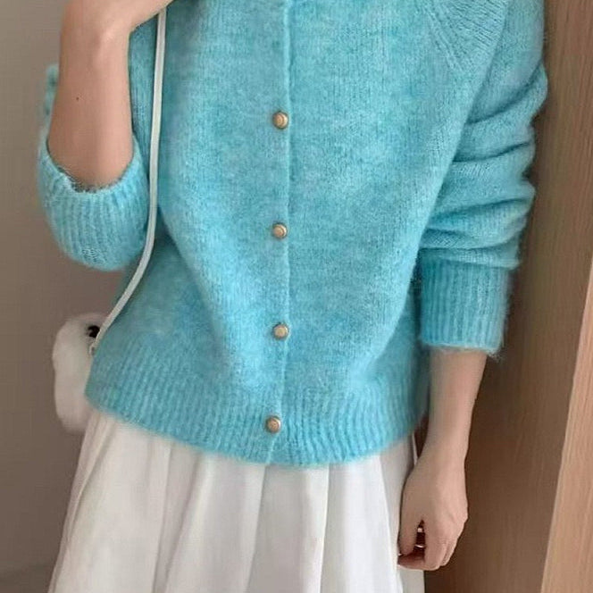 Løs og blød cardigan i ensfarvet strik