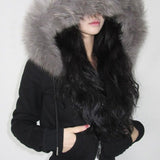 hættejakke med pelskant og lynlås i taljen