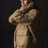 Paillettejakke med høj krave og lommer