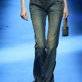 Lavtaljede jeans med svaj og nitter