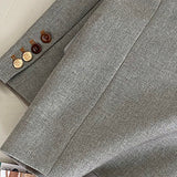 Oversized spættet blazer med knæ