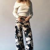 Afslappede jeans med vintage ko-print