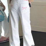 Lyserøde jeans med brede ben og broderet sløjfe