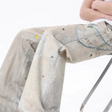 Højtaljede, vide tie-dye jeans