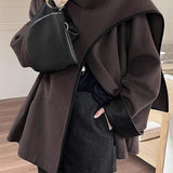 Asymmetrisk frakke med sjalkrave og farveblokke