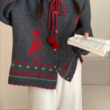 Oversized vest med pomponer