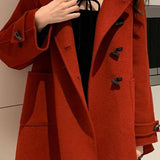 Frakke i uldblanding med frogging