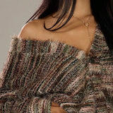 Løstsiddende cardigan med farverige striber og V-hals