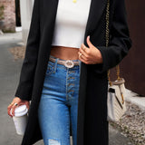 Lang, ensfarvet frakke i uldblanding