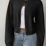 Let cardigan med rund hals og knapper