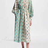 Elegant skjortekjole med print og pufærmer og charmerende