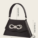 Elegant silke brudeclutch med sløjfe af rhinsten