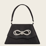 Elegant silke brudeclutch med sløjfe af rhinsten