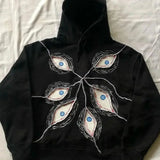 Mørk gotisk hættetrøje med ondt øje og hiphop-design