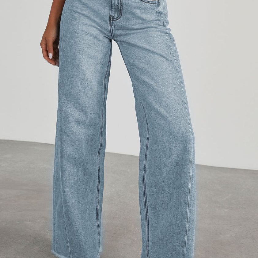 Minimalistiske, ensfarvede jeans med vide, falmede ben