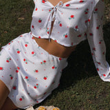 Todelt sæt: cardigan og langærmet nederdel i trykt satin