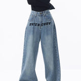 Højtaljede jeans, vide og rummelige ben, gulvlange