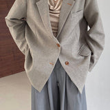 Oversized spættet blazer med knæ