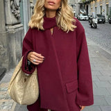 Uldfrakke med tørklædekrave og enkeltradede knapper