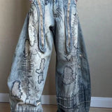 jeans med vide ben og nålebroderi