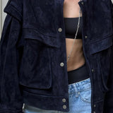 Ruskindsjakke med lommer og brede skuldre