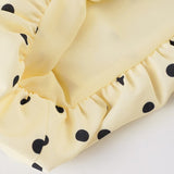 Tulipan minikjole med åben ryg og polkaprikket bælte