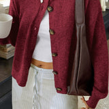 Minimalistisk cardigan med lange ærmer og knapper