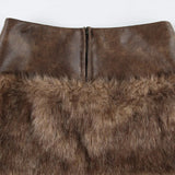 Lavtaljet mini-nederdel med bløde læderpaneler