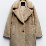 Varm frakke med lange ærmer og revers i kunstpels