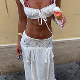 Strandnederdel og bikini-sarongsæt med udskåret talje