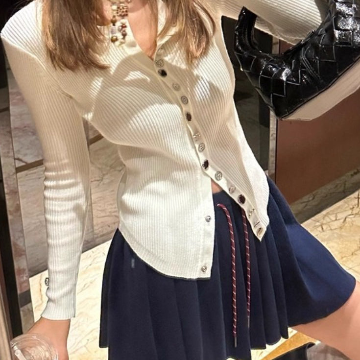 Plisseret mini-nederdel i strik