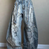 jeans med vide ben og nålebroderi