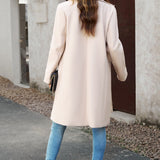 Lang, ensfarvet frakke i uldblanding