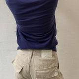 Cargojeans med lige ben og dekonstruerede paneler